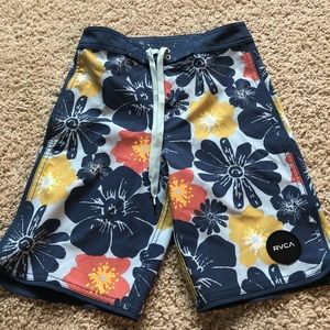 Boys RVCA board shorts.